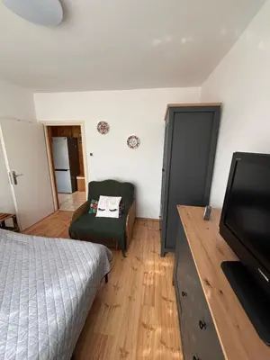 Łóżko lub łóżka w pokoju w obiekcie Chełmski Zakątek