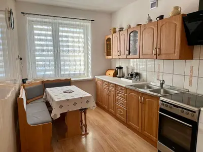 Kuchnia lub aneks kuchenny w obiekcie Chełmski Zakątek