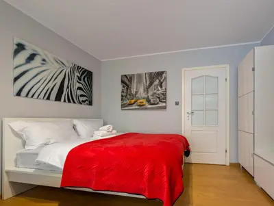 Łóżko lub łóżka w pokoju w obiekcie Pochyła Green Haven Apartment by BookingHost