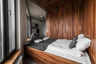 Łóżko lub łóżka w pokoju w obiekcie RentPlanet - Studio Legnicka