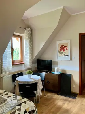Część wypoczynkowa w obiekcie POKOJE GOŚCINNE Złote Modrzewie