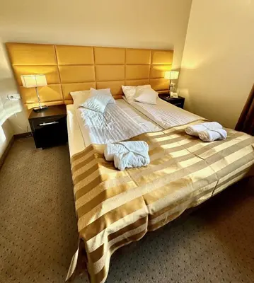 Łóżko lub łóżka w pokoju w obiekcie Hotel Pod Dębami
