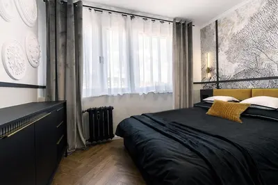 Łóżko lub łóżka w pokoju w obiekcie Green Flat 1