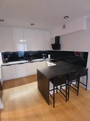 Kuchnia lub aneks kuchenny w obiekcie Słoneczny Apartament