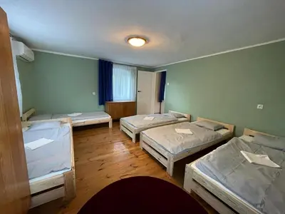 Łóżko lub łóżka w pokoju w obiekcie wiejski domek z altaną i grillem
