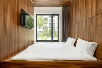 Łóżko lub łóżka w pokoju w obiekcie Legnicka Cozy & Modern Studio in Wrocław by Noclegi Renters