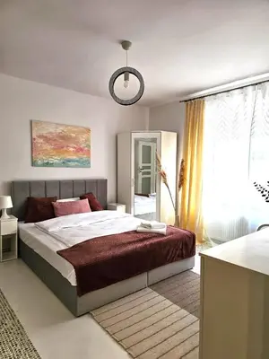 Łóżko lub łóżka w pokoju w obiekcie Tabago Studio 36 Brzeg Chopina