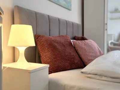 Łóżko lub łóżka w pokoju w obiekcie Tabago Studio 36 Brzeg Chopina