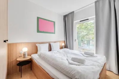 Łóżko lub łóżka w pokoju w obiekcie Czysta 4 - B by Homeprime
