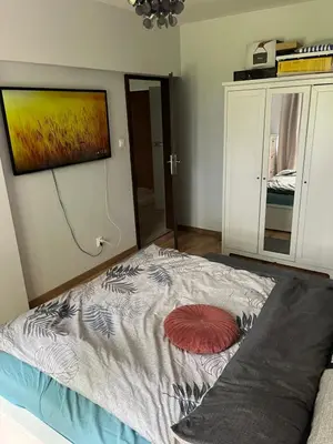 Łóżko lub łóżka w pokoju w obiekcie Wrocław Manganowa