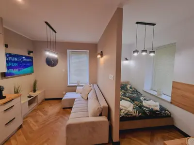 Telewizja i/lub zestaw kina domowego w obiekcie JEDLINA Park
