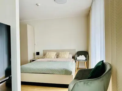 Łóżko lub łóżka w pokoju w obiekcie Oro Apartments Centrum Wrocław