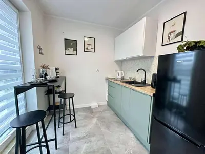 Kuchnia lub aneks kuchenny w obiekcie Oro Apartments Centrum Wrocław