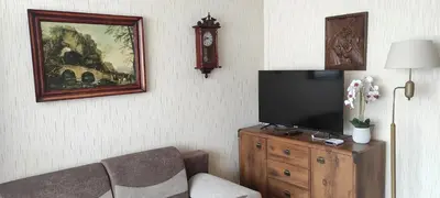 Telewizja i/lub zestaw kina domowego w obiekcie Apartament z widokiem na góry