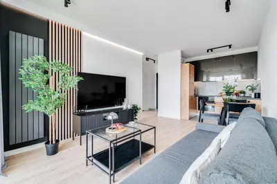 Telewizja i/lub zestaw kina domowego w obiekcie Rent Invest - Braniborska Apartament Parking Klimatyzacja