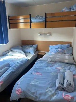 Łóżko lub łóżka w pokoju w obiekcie 4 sowy Góry Sowie
