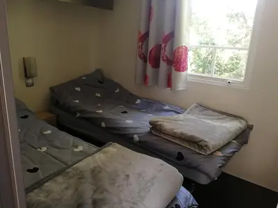 Łóżko lub łóżka w pokoju w obiekcie 4 sowy Góry Sowie