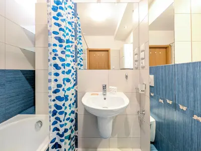 Łazienka w obiekcie Mosiężna Przystań Homely Apartment by BookingHost