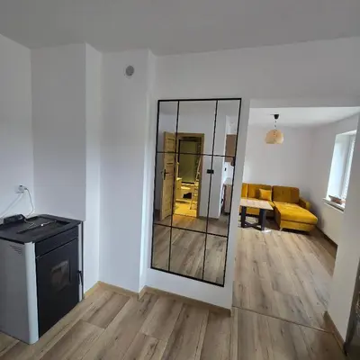 Łóżko lub łóżka w pokoju w obiekcie Apartament z kominkiem w starej kamiennicy