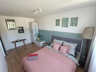 Łóżko lub łóżka w pokoju w obiekcie Apartament Magiczne Poranki