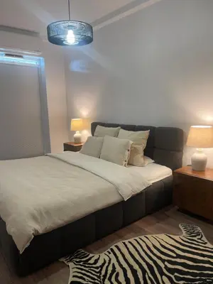 Łóżko lub łóżka w pokoju w obiekcie Blisko Ryneczku 2