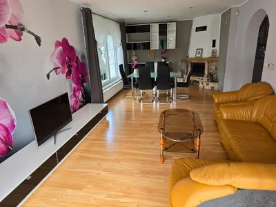 Telewizja i/lub zestaw kina domowego w obiekcie Willa na Ogrodowej