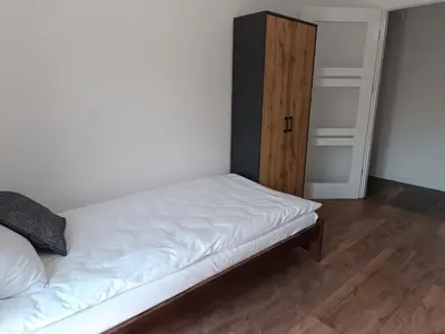 Łóżko lub łóżka w pokoju w obiekcie Loft Apartments Bielawa 