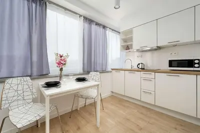 Kuchnia lub aneks kuchenny w obiekcie Bright Studio with Air Conditioning and Parking by Noclegi Renters