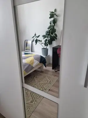 Łóżko lub łóżka w pokoju w obiekcie Apartament Kościelna