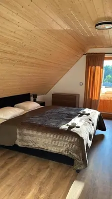 Łóżko lub łóżka w pokoju w obiekcie Stawowy Zakątek