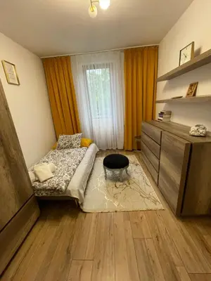 Łóżko lub łóżka w pokoju w obiekcie Magiczny apartament