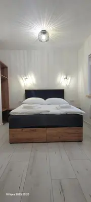 Łóżko lub łóżka w pokoju w obiekcie Domek Usiebie