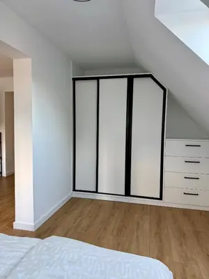 Łóżko lub łóżka w pokoju w obiekcie Apartament u Kuby z kącikiem zabaw