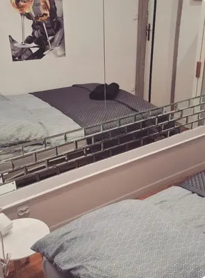 Łóżko lub łóżka w pokoju w obiekcie Apartament Antracyt