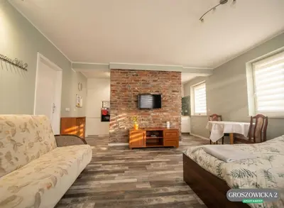 Telewizja i/lub zestaw kina domowego w obiekcie Apartament 40m2 Opole i Darmowy Parking
