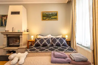 Łóżko lub łóżka w pokoju w obiekcie Villa Margaret