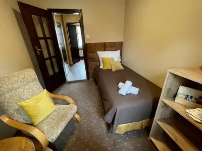 Łóżko lub łóżka w pokoju w obiekcie Romantika-Noclegi ze śniadaniem