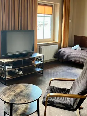 Telewizja i/lub zestaw kina domowego w obiekcie Romantika-Noclegi ze śniadaniem