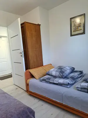 Łóżko lub łóżka w pokoju w obiekcie Apartament Zdrojowa 20, Duszniki Zdrój
