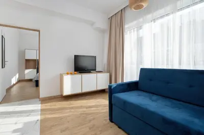 Telewizja i/lub zestaw kina domowego w obiekcie Indigo Apartment Wrocław by Solarento