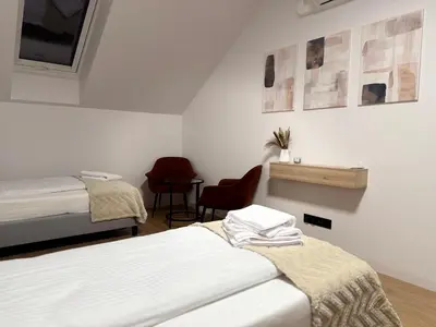 Łóżko lub łóżka w pokoju w obiekcie Jack Apartments- Apartamenty z garażem