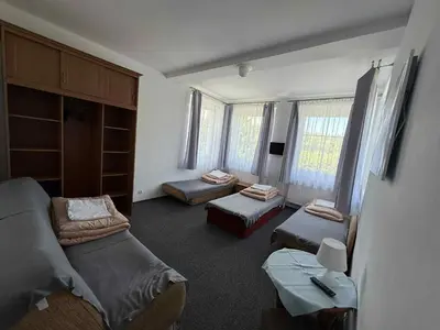 Łóżko lub łóżka w pokoju w obiekcie Ośrodek Skałka