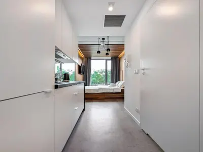 Łóżko lub łóżka w pokoju w obiekcie Legnicka Homely Studio by BookingHost