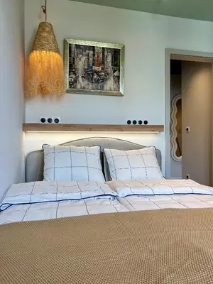 Łóżko lub łóżka w pokoju w obiekcie Boho Apartment - 100m from Market Square