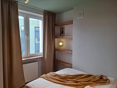 Łóżko lub łóżka w pokoju w obiekcie Boho Apartment - 100m from Market Square
