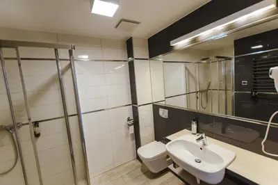 Łazienka w obiekcie VacationClub - BORMIO Apartament 17