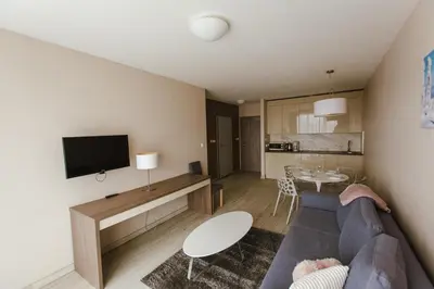 Telewizja i/lub zestaw kina domowego w obiekcie VacationClub - BORMIO Apartament 17