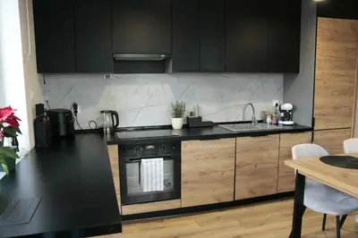 Kuchnia lub aneks kuchenny w obiekcie Apartament na Letniej