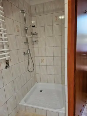 Łazienka w obiekcie Pokoje Szmaragd
