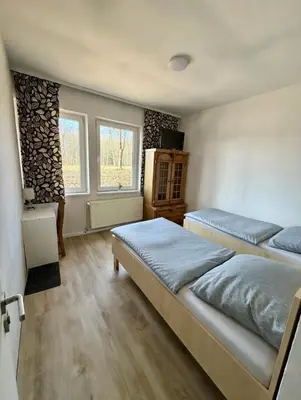 Łóżko lub łóżka w pokoju w obiekcie Pokoje na wynajem Rybnik Rudzka
